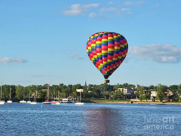 Balloon Art Print featuring the photograph Hot air balloon over Hudson Wisconsin by Louise Heusinkveld