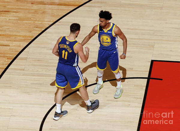 Klay Thompson Art Print featuring the photograph Klay Thompson and Jonas Jerebko by Mark Blinch