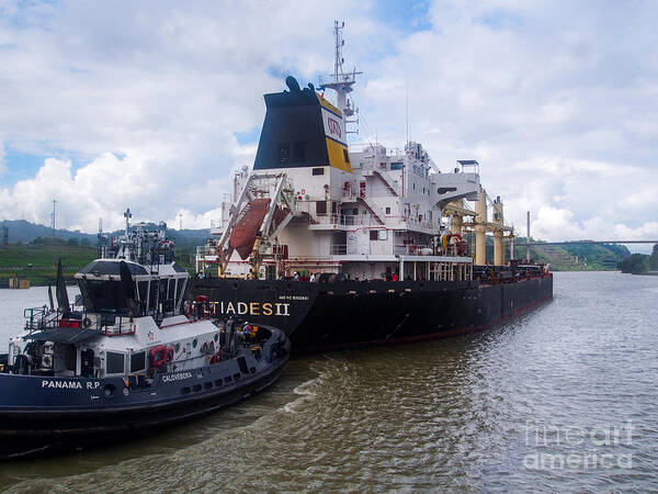 Panama Canal Art Print featuring the photograph Miltiades II and a Tugboat on the Panama Canal by L Bosco