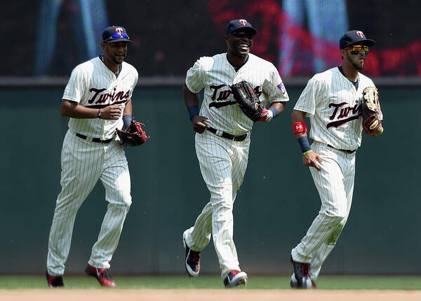 People Art Print featuring the photograph Torii Hunter, Aaron Hicks, and Eddie Rosario by Hannah Foslien