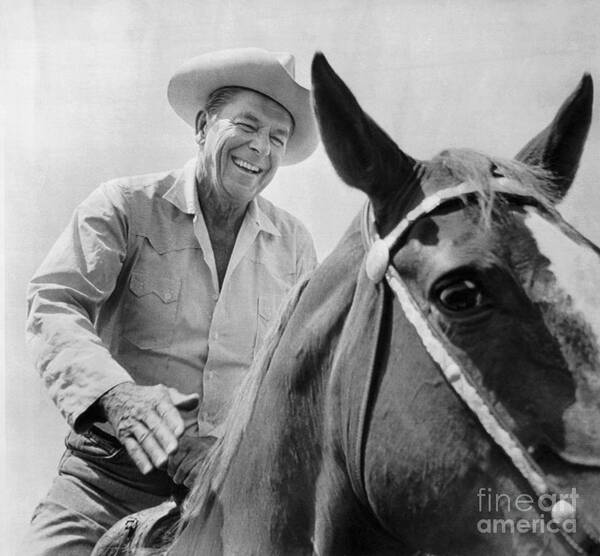 People Art Print featuring the photograph Ronald Reagan Riding His Horse by Bettmann