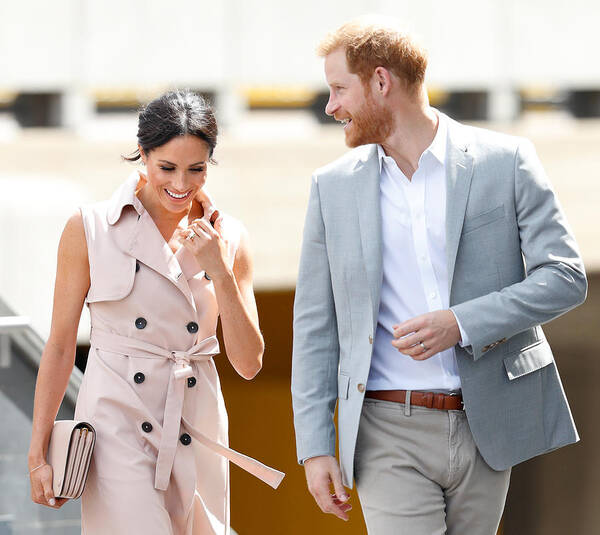 Trench Coat Art Print featuring the photograph The Duke & Duchess of Sussex Visit The Nelson Mandela Centenary Exhibition #8 by Max Mumby/Indigo