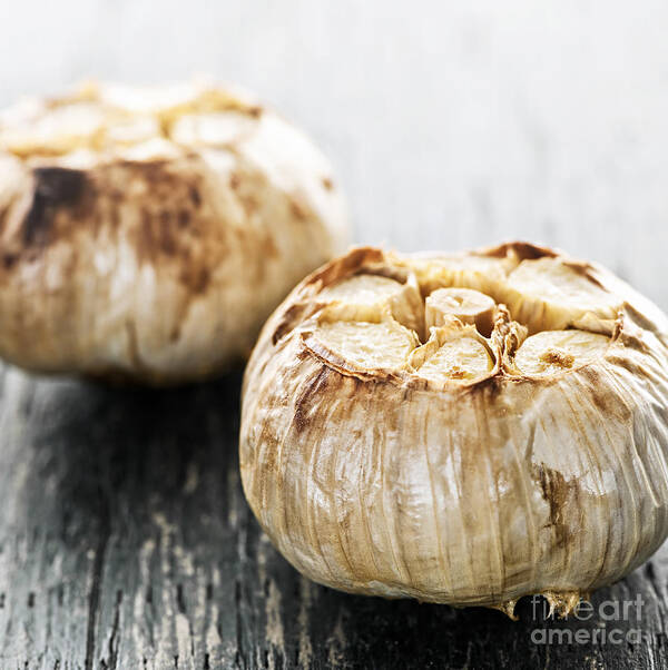 Garlic Art Print featuring the photograph Roasted garlic bulbs 2 by Elena Elisseeva