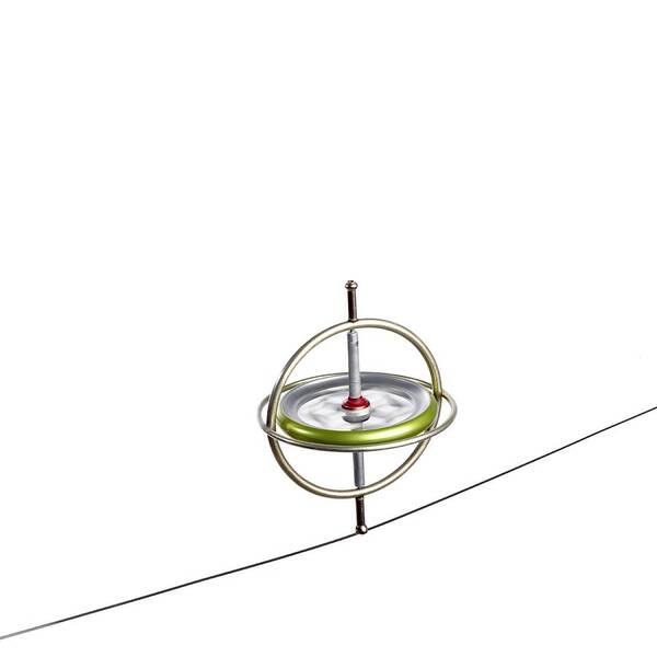 Compass Art Print featuring the photograph Gyroscope Balancing On A Wire by Science Photo Library