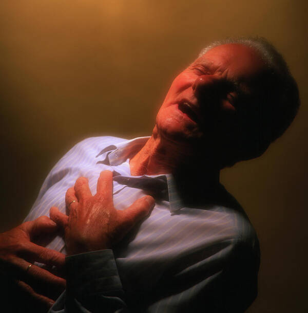 Man Art Print featuring the photograph Man Holds His Chest Due To Angina Or Heart Attack #2 by Saturn Stills/science Photo Library