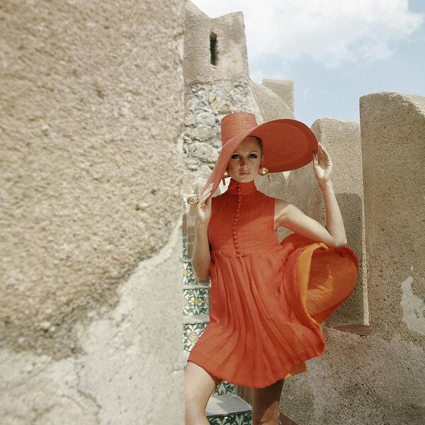 Fashion Art Print featuring the photograph A Model Wearing A Orange Dress by Henry Clarke