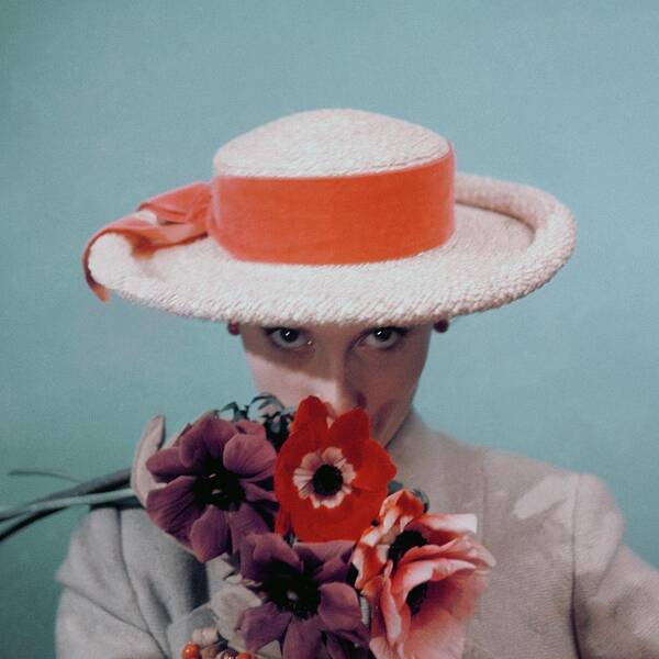 Fashion Art Print featuring the photograph A Model Wearing A Straw Hat by Clifford Coffin