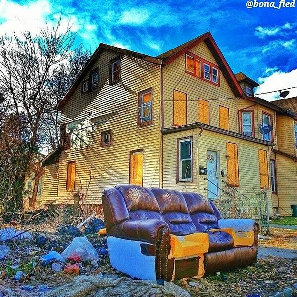  Art Print featuring the photograph Blue Skies Over Poverty. Couch For Sale by Brian Lyons