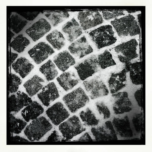Cobblestone Art Print featuring the photograph Cobblestone pavement black and white by Matthias Hauser