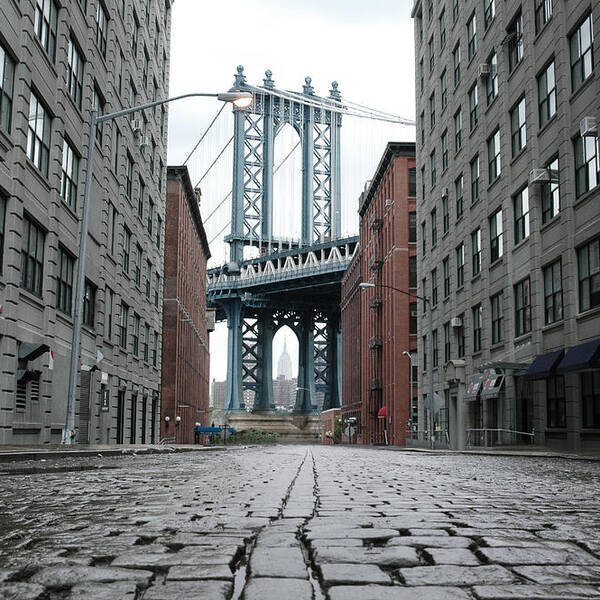 Scenics Art Print featuring the photograph Empty street and Brooklyn bridge by Miguel Navarro