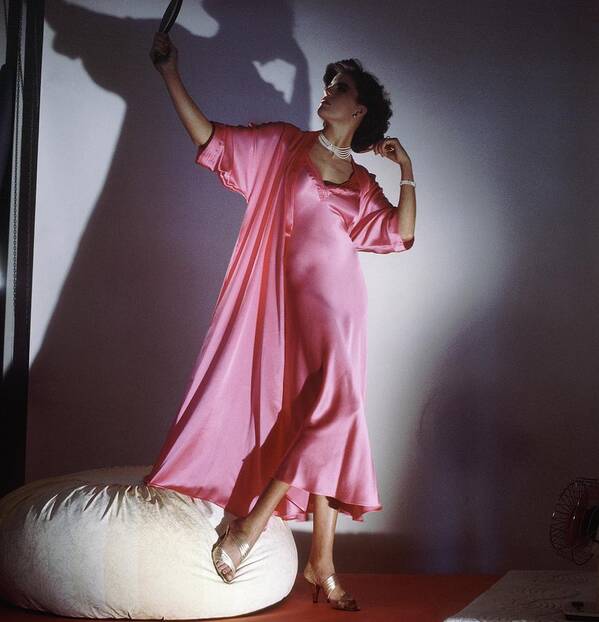 Studio Shot Art Print featuring the photograph Model Wearing Pink Nightgown And Robe by Horst P. Horst