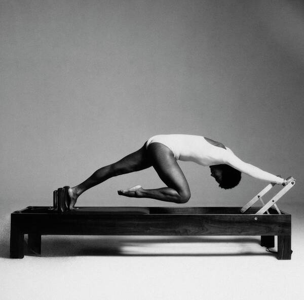 Beauty Art Print featuring the photograph Paula Kelly Exercising On The 'reformer' Machine by Francesco Scavullo