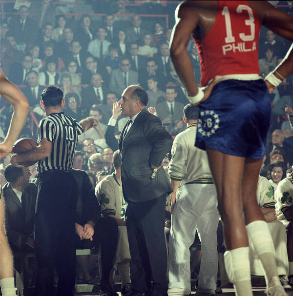 Marvin Newman Art Print featuring the photograph Red Auerbach Talks With Ref by Retro Images Archive