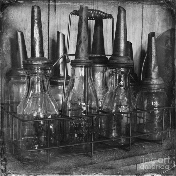 Bottles Art Print featuring the photograph Vintage Oil Bottles by Carrie Cranwill