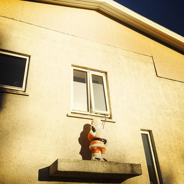 Quirky Art Print featuring the photograph Xmas decoration with Santa in June Akureyri Iceland by Matthias Hauser