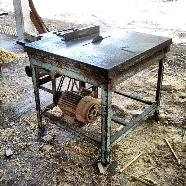 Wood Art Print featuring the photograph A Trusty And Well Worn Table Saw In A by Reid Nelson