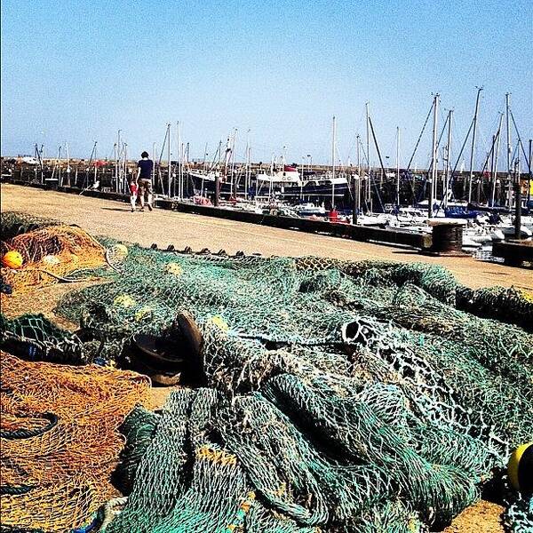 Seaside Art Print featuring the photograph #harbour #coast #seaside #boats #nets by Laura Hoole