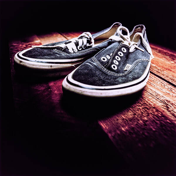 Black Art Print featuring the photograph Classic Vintage Skateboard Shoes on Wood by YoPedro