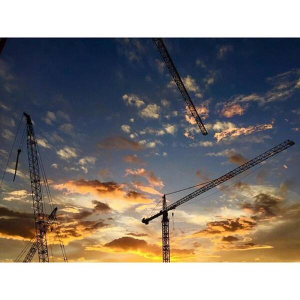 Miamiphotographer Art Print featuring the photograph Construction Cranes At Sunset by Juan Silva