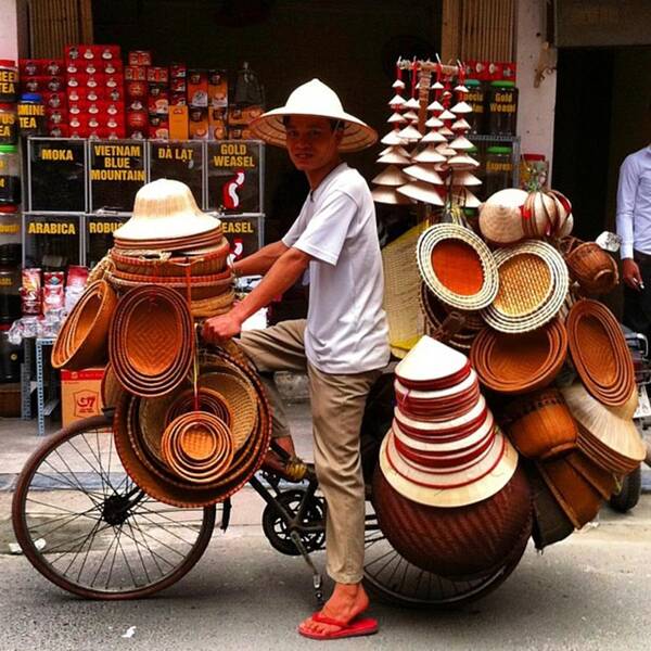 Tourist Art Print featuring the photograph Hanoi Street Hat by Paul Dal Sasso