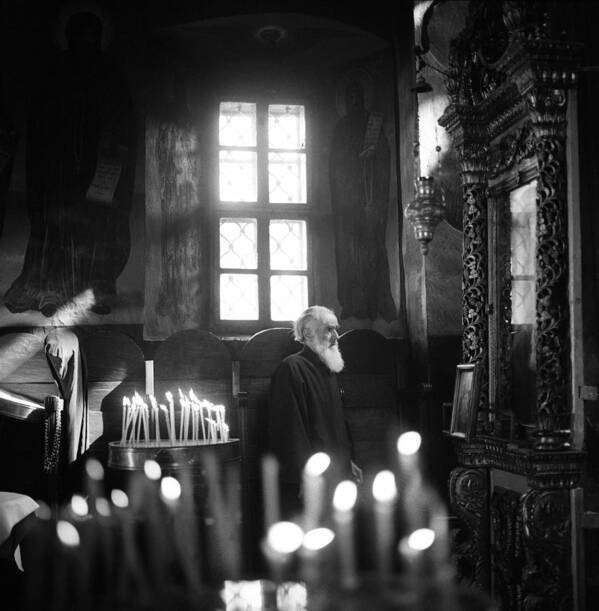 Monk Art Print featuring the photograph Monk and candles by Emanuel Tanjala