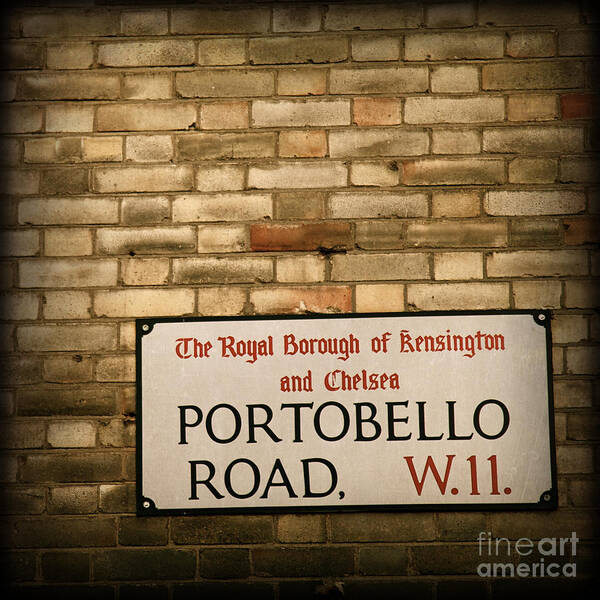Portobello Road Art Print featuring the photograph Portobello Road Sign on a Grunge Brick Wall in London England by ELITE IMAGE photography By Chad McDermott