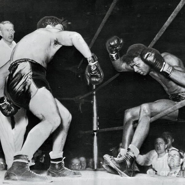 Fist Art Print featuring the photograph Boxers In Action by Bettmann