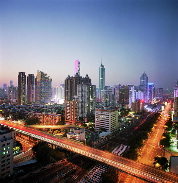 Corporate Business Art Print featuring the photograph China, Shenzen Skyline At Dusk by Martin Puddy