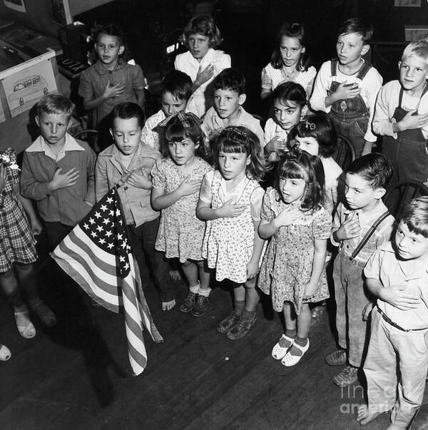 Education Art Print featuring the photograph First Graders Reciting Pledge by Bettmann