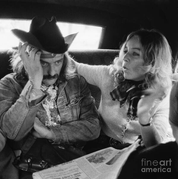 People Art Print featuring the photograph France Daunic Seated With Dennis Hopper by Bettmann