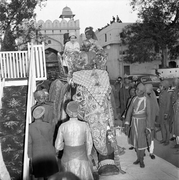 Royalty Art Print featuring the photograph Queen Elizabeth II Rides An Elephant by Michael Ochs Archives