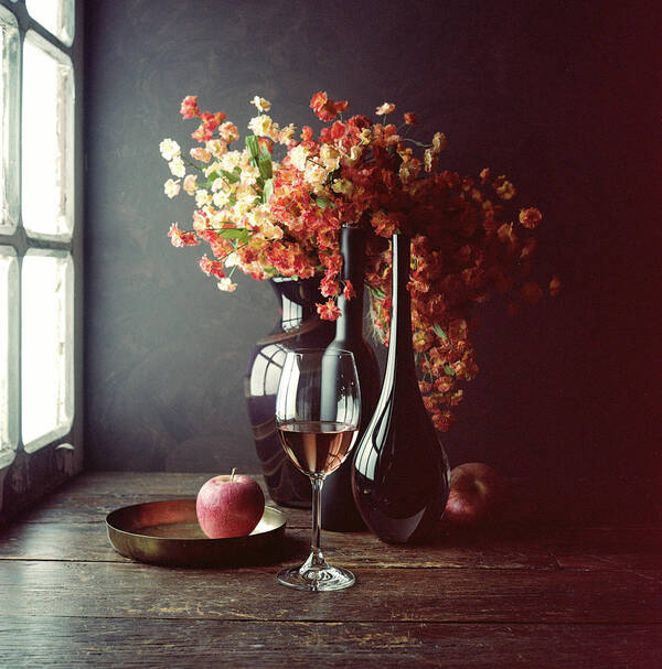 Still Life Art Print featuring the photograph Still Life With Wine And An Apple by Luiz Laercio