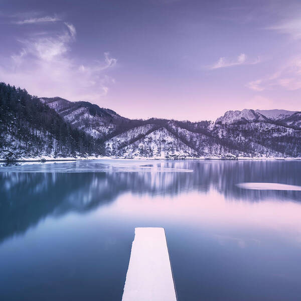 Lake Art Print featuring the photograph Gramolazzo iced lake and snowy pier in Apuan mountains. by Stefano Orazzini