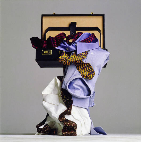 Still Life Art Print featuring the photograph Still Life of Suitcase with Mens Clothes by Walter Chin