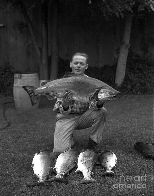 Fishermen Art Print featuring the photograph Fisherman with his catch Salmon from Monterey Bay Circa 1955 by Monterey County Historical Society