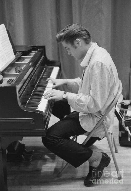Elvis Presley Art Print featuring the photograph Elvis Presley on piano while waiting for a show to start 1956 by The Harrington Collection