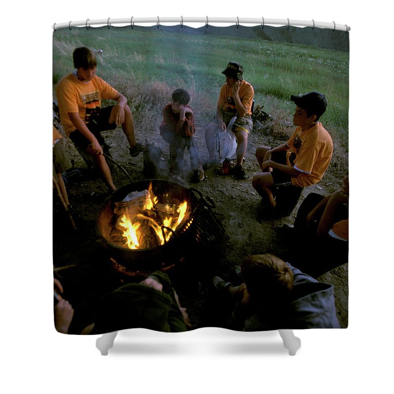 Adventure Shower Curtain featuring the photograph A Group Of Boy Scouts Sits #1 by Corey Rich