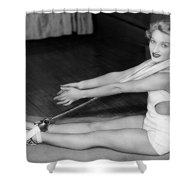 1035-226 Shower Curtain featuring the photograph A Young Woman Exercising #1 by Underwood Archives