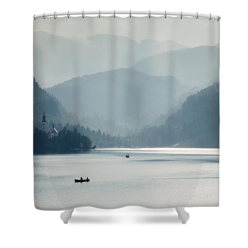 Bled Shower Curtain featuring the photograph Breaking through the mist #1 by Ian Middleton