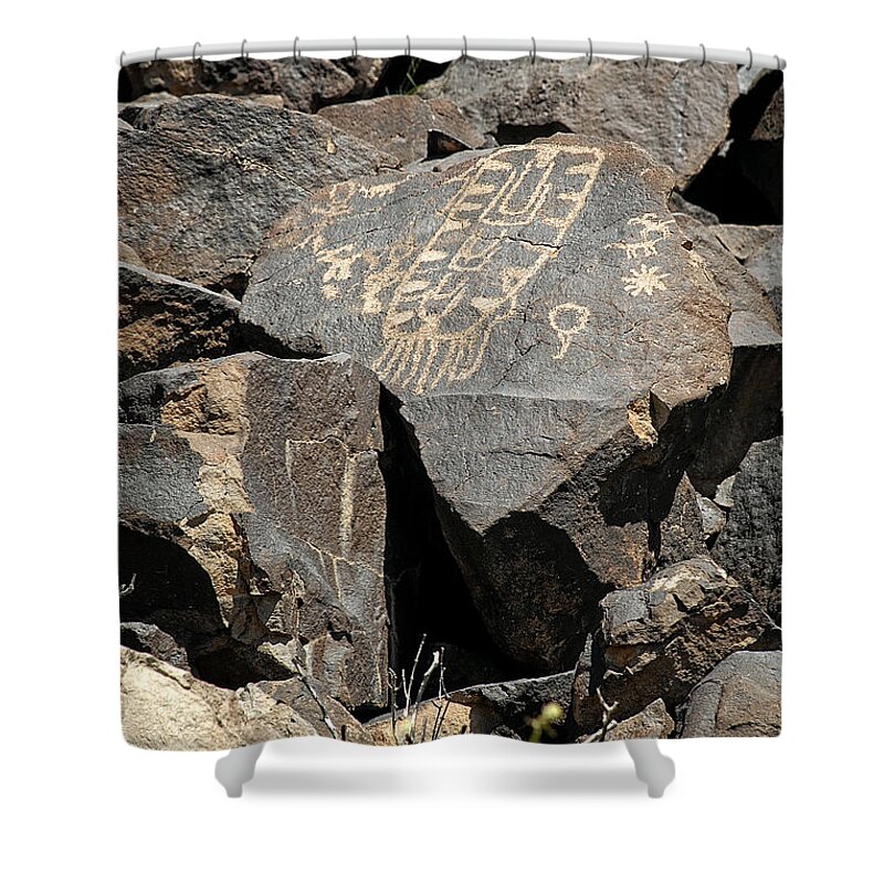 Petroglyph Shower Curtain featuring the photograph Medicine bag petroglyph by John Bennett