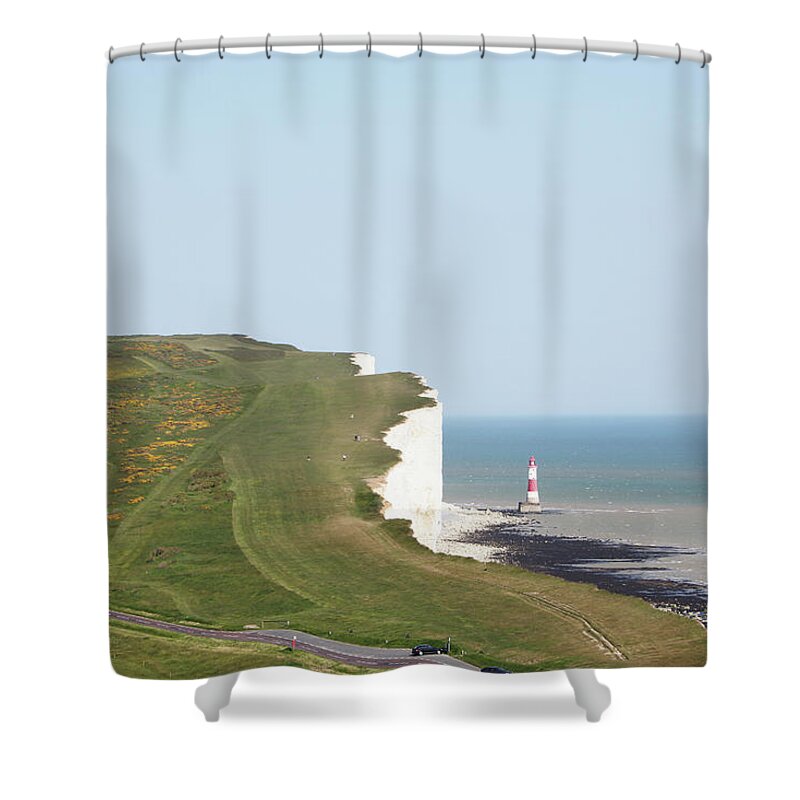 Tranquility Shower Curtain featuring the photograph People Walking On Beachy Head #1 by Richard Newstead