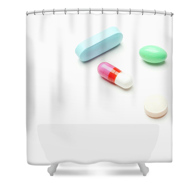 White Background Shower Curtain featuring the photograph Pills And Capsules On White Background #1 by Vstock Llc