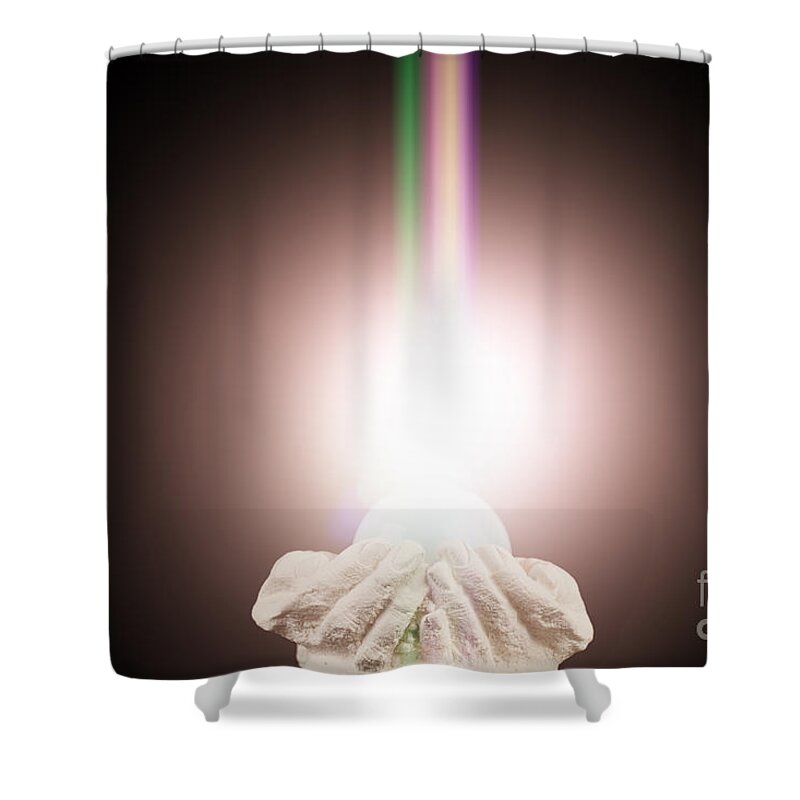  Spiritual Shower Curtain featuring the photograph Spiritual light in cupped hands on a black background by Simon Bratt