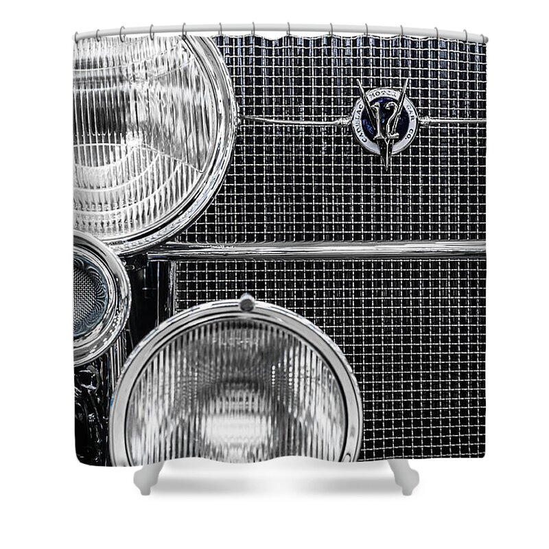 1935 Shower Curtain featuring the photograph 1935 Cadillac V12 Roadster Emblem and Headlights 1 by Ron Pate