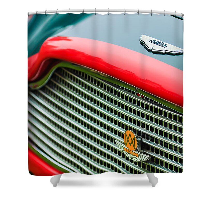 1960 Aston Martin Db4 Gt Coupe' Grille Emblem Shower Curtain featuring the photograph 1960 Aston Martin DB4 GT Coupe' Grille Emblem by Jill Reger