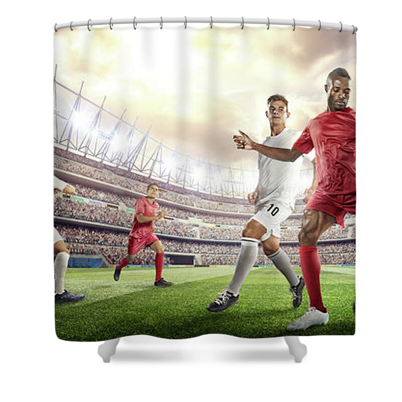 Soccer Uniform Shower Curtain featuring the photograph Soccer Player Kicking Ball In Stadium #3 by Dmytro Aksonov