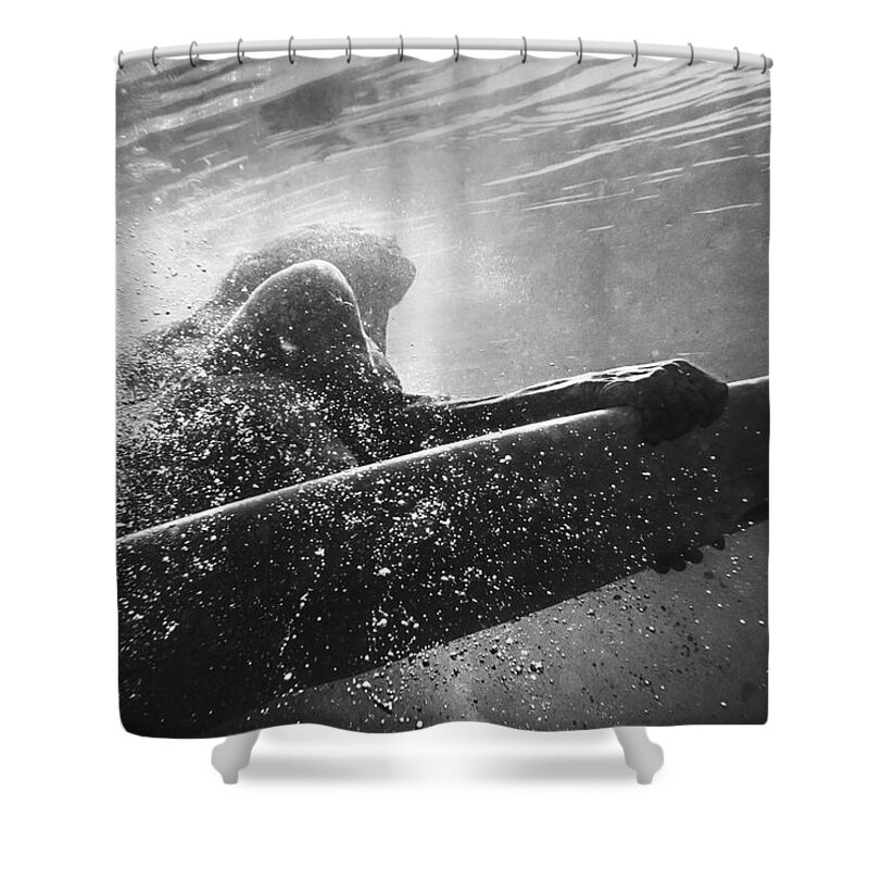 Underwater Shower Curtain featuring the photograph A Woman On A Surfboard Under The Water by Ben Welsh