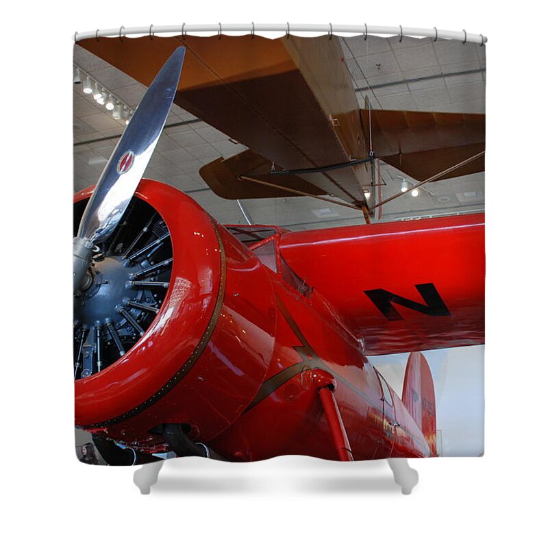 Amelia Earhart Shower Curtain featuring the photograph Amelia Earhart Prop Plane by Kenny Glover