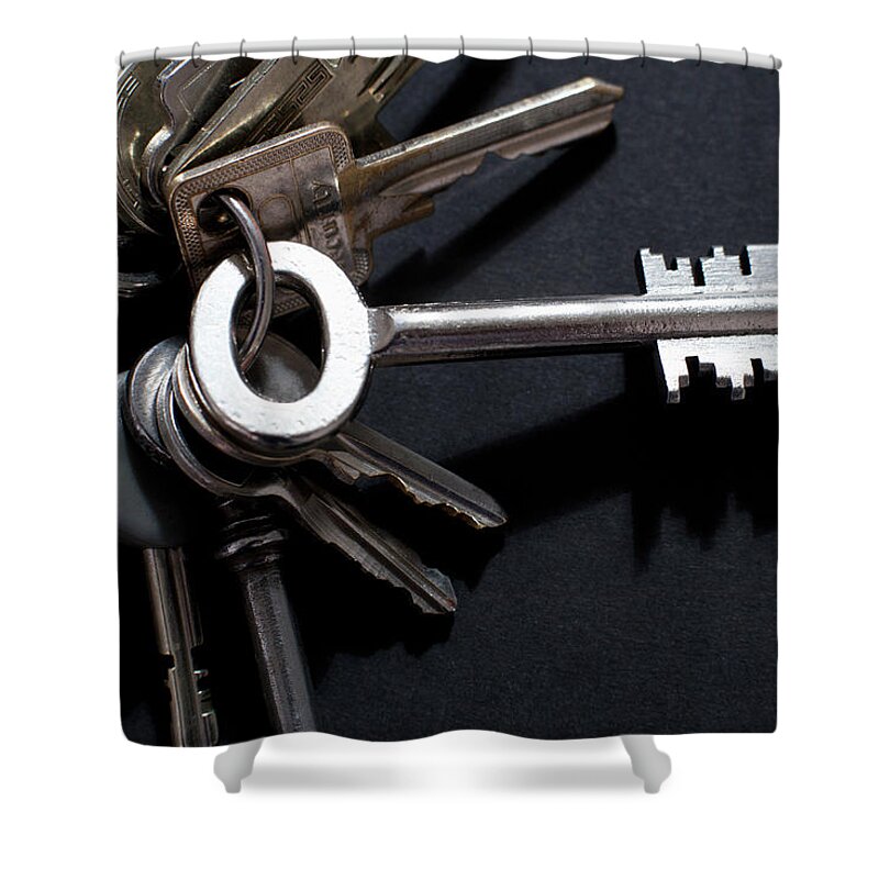 Security Shower Curtain featuring the photograph An Odd Shaped Old-fashioned Key by Larry Washburn