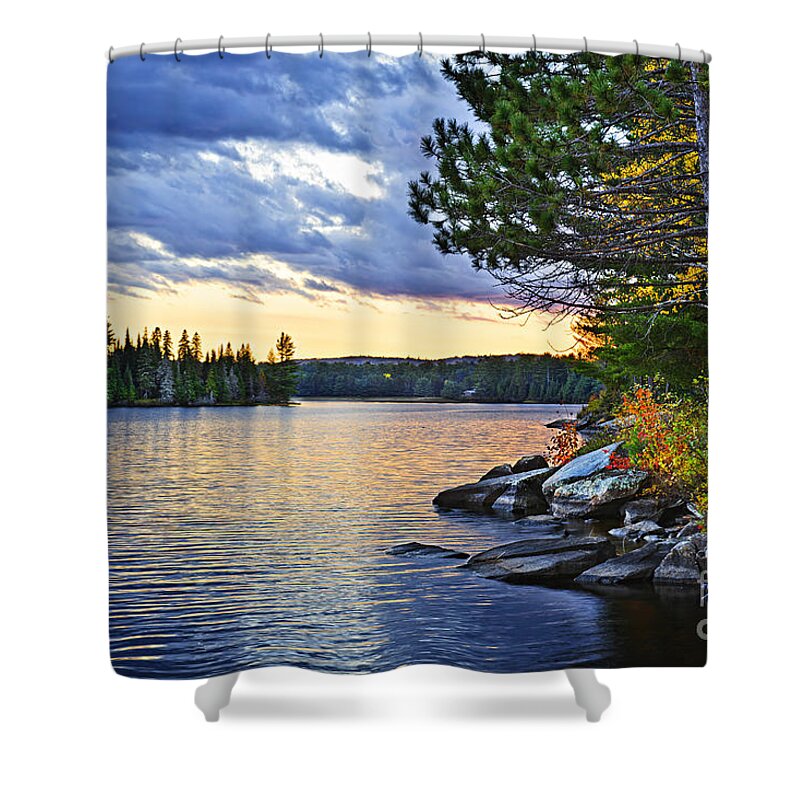 Sunset Shower Curtain featuring the photograph Autumn sunset at lake by Elena Elisseeva